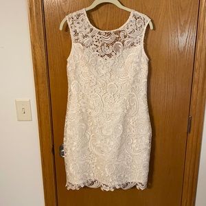 A beautiful cream-colored, lace dress